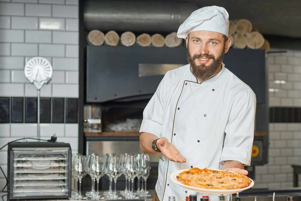Quelle est la méthode pour réaliser une pâte à pizza au levain naturel ?